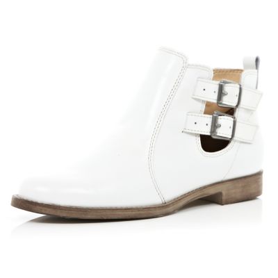 White buckle cut out ankle boots