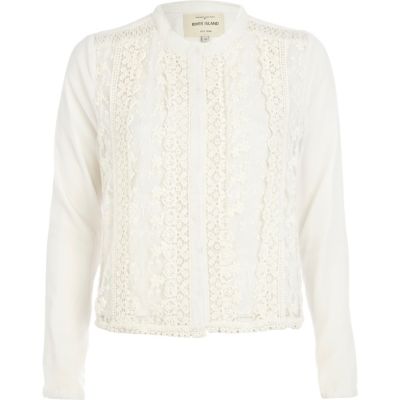Cream collarless lace jacket