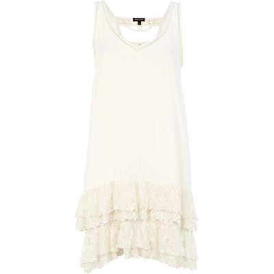 Cream ruffle hem V neck sleeveless dress