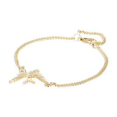 Gold tone swallow bracelet