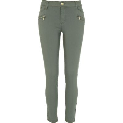 Green skinny biker trousers