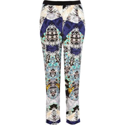 Blue kaleidoscope print smart trousers