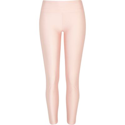 Pastel pink wet look high waisted leggings