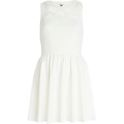 Cream cut out sleeveless skater dress