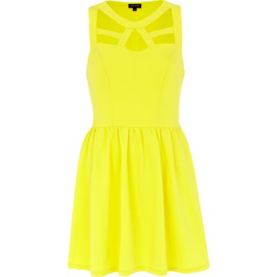 Yellow cut out sleeveless skater dress