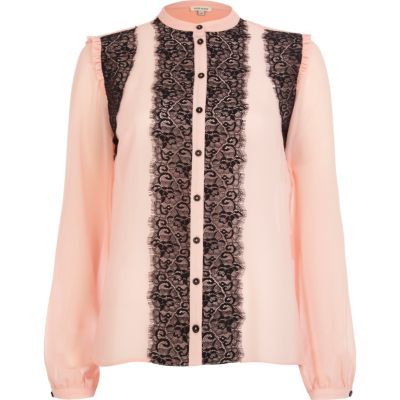 Pink lace front frilly blouse