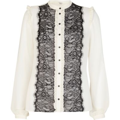 Cream lace front frilly blouse