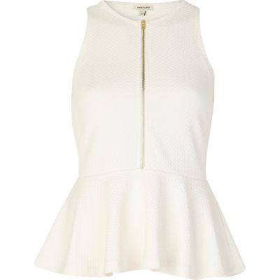 White textured zip front peplum top