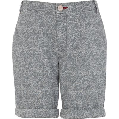 Light blue floral print roll hem shorts