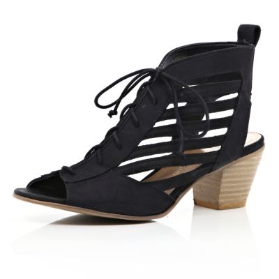 Black cut out block heels