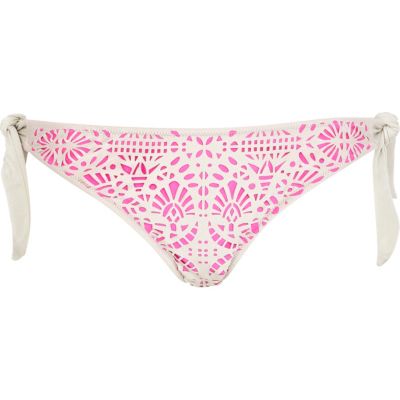 Pink laser cut tie side bikini bottoms