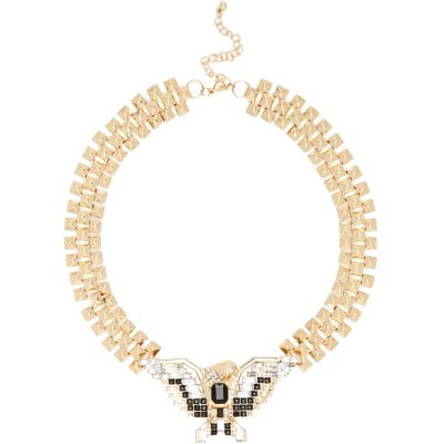 Gold tone eagle statement necklace 