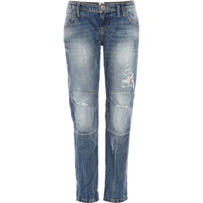Mid wash distressed slouch jeans
