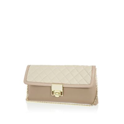 Cream quilted flip lock clutch bag