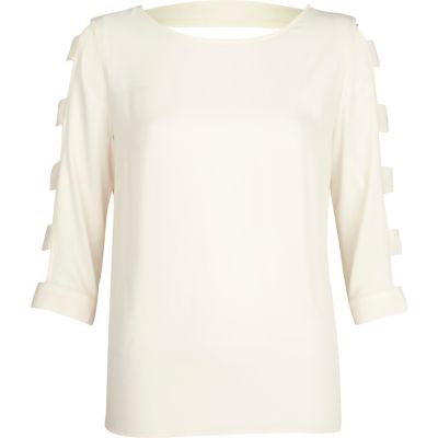 Cream cut out sleeve top