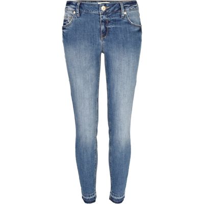 Mid wash Taylor skinny jeans