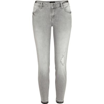 Grey distressed Taylor skinny jeans