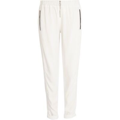 White zip front trousers