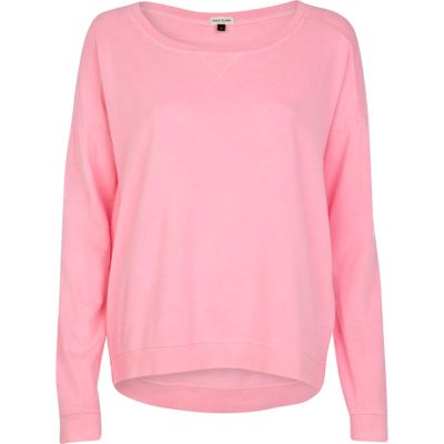 Bright pink dip hem sweatshirt