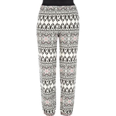White tribal print trousers
