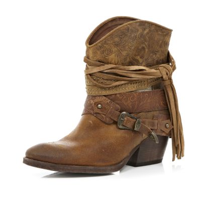 Brown wrapped buckle western boots