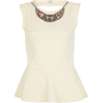 White textured tribal necklace peplum top