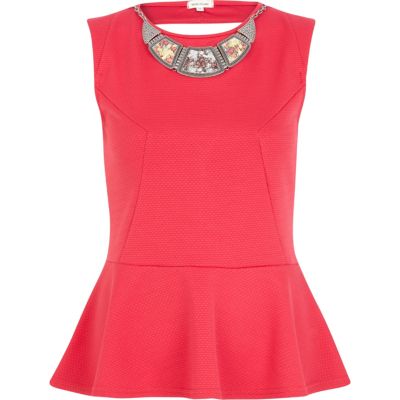 Pink textured necklace peplum top