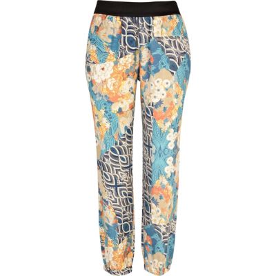 Blue tropical print trousers