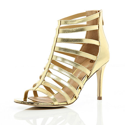 Gold mid heel gladiator sandals