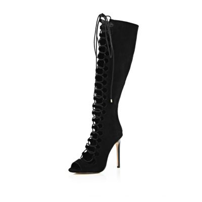 Black lace-up knee high heeled boots