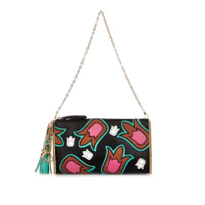 Black appliqué pattern handbag