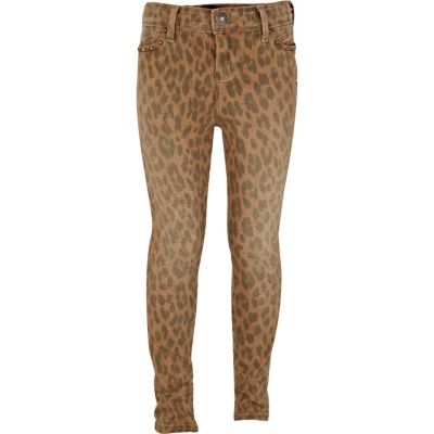 Girls brown animal print skinny jeans