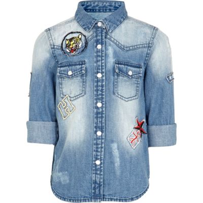 Girls blue mid wash denim badge shirt