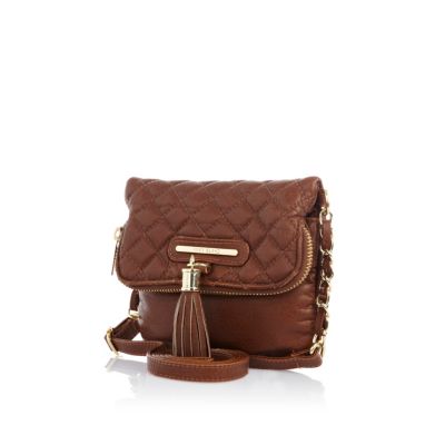 Girls brown fold over tassel bag