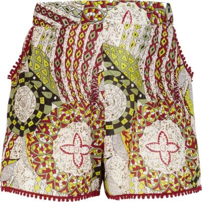 Girls green tribal print shorts