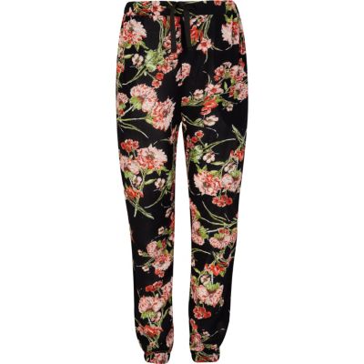 Girls dark blue floral trousers
