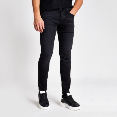 washed black skinny jeans