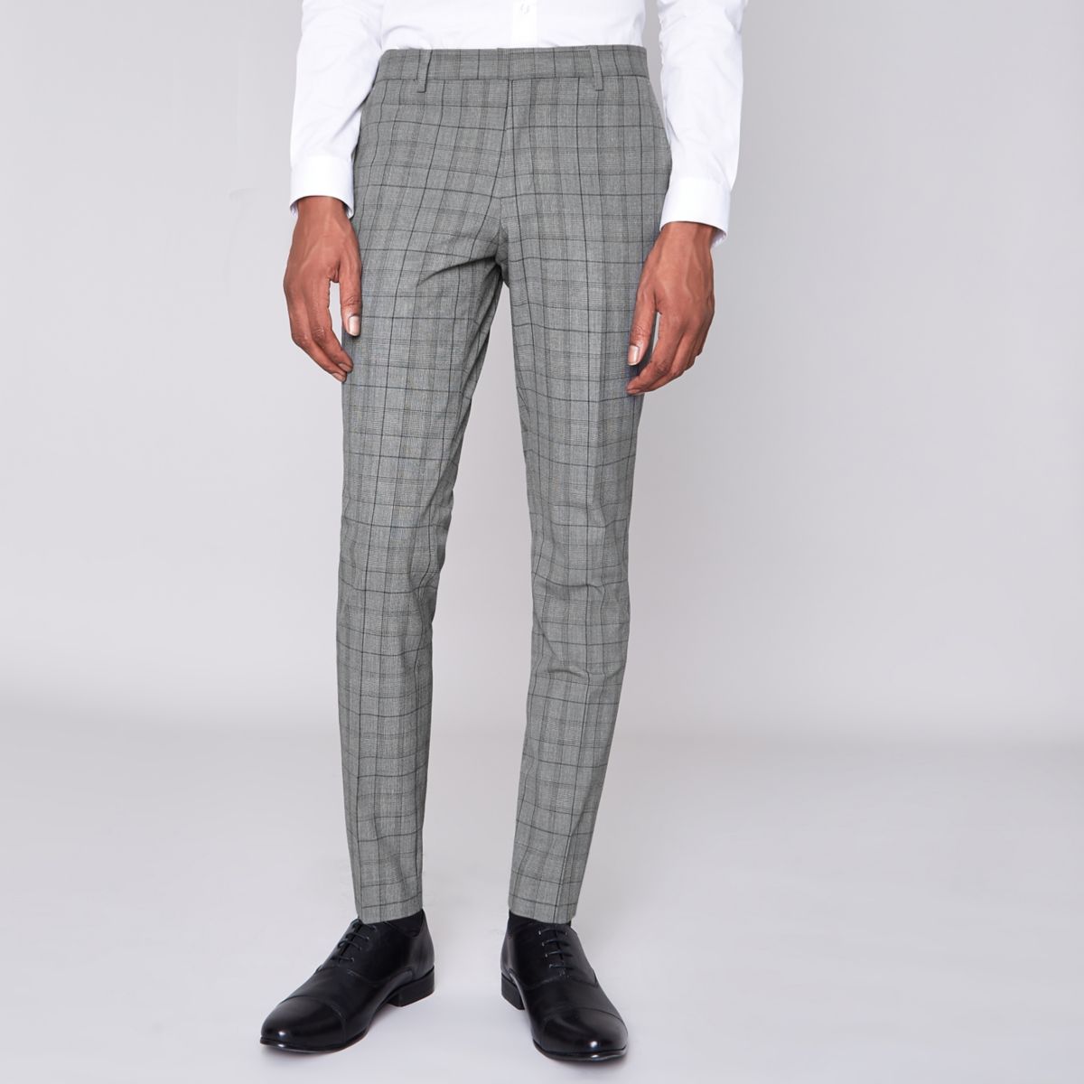 men's outfit with grey checked trousers