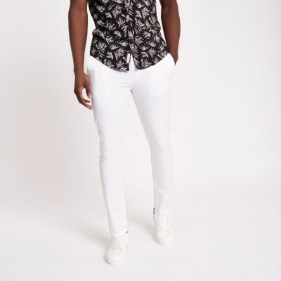 White skinny chino trousers White skinny chino trousers ...