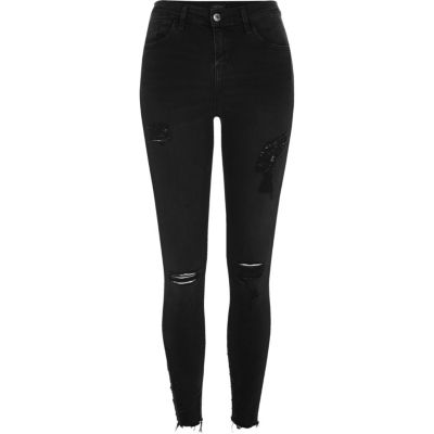 Amelie – Jean super skinny délavage noir déchiré