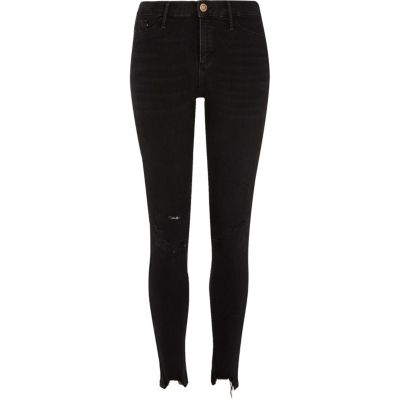 Molly – Jegging skinny noir à ourlet brut
