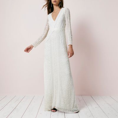 River Island CrÃ¨me maxi-jurk met lovertjes en lange mouwen