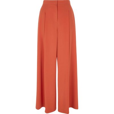 rust orange trousers