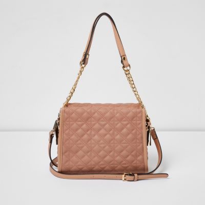 pink quilted bag with chain