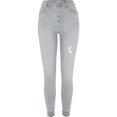 Amelie – Jean super skinny bleu à ourlet défait