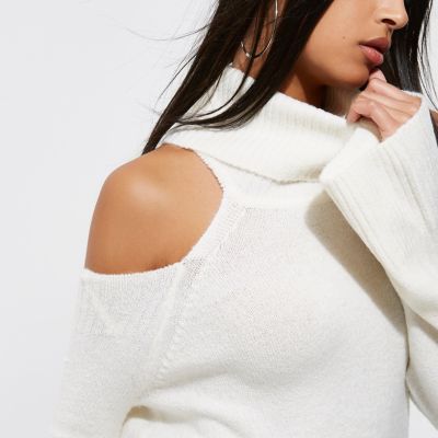 Cream cold shoulder roll neck jumper