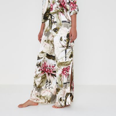 Crème satijnen pyjamabroek met tropische print