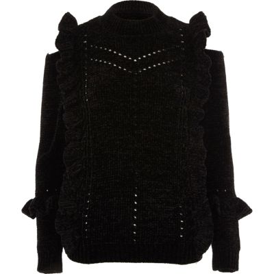 Pull en maille chenille noir à volants et découpes aux épaules