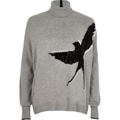 Grauer, nietenverzierter Rollkragenpullover