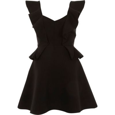 Robe patineuse péplum noire à volants